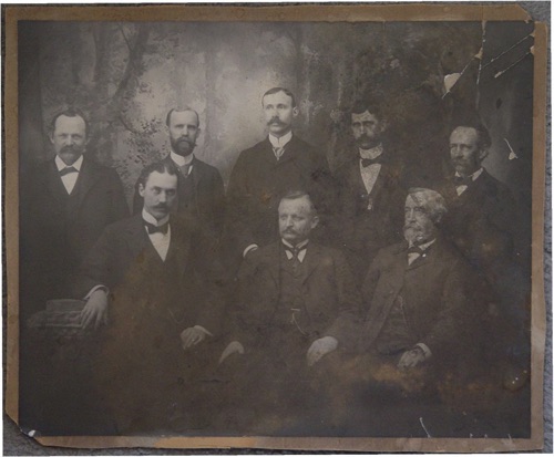 The Original Conklin Team; some of the original business partners of George R. Conklin around the turn of the century: front row, George Strong, Warwick; George M. Roe, Chester; Mr. Conklin. Back row, George Sullivan, New Milford; John Cummins, Goshen; Zeal Paddleford, Monroe; Charles T. Mott, Vernon, N.J.; William J. Gaunt, Monroe. Circa 1900. chs-005356